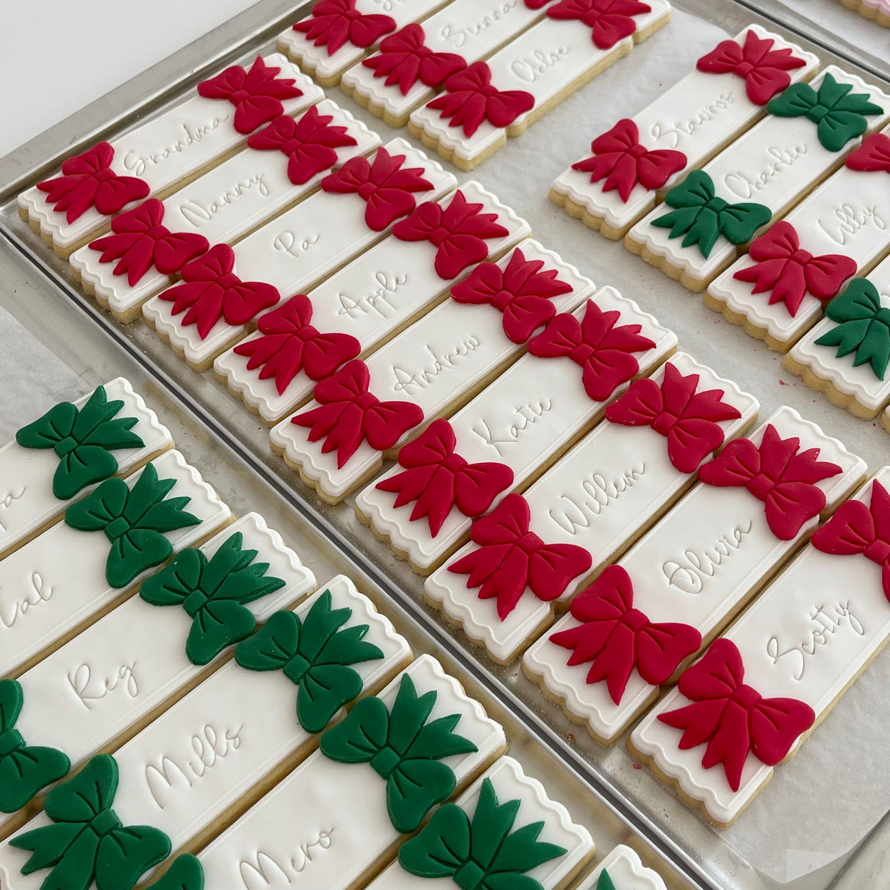 Full-sized hand-decorated Christmas Bon Bon cookies with festive holiday designs, ideal for gifting or sharing