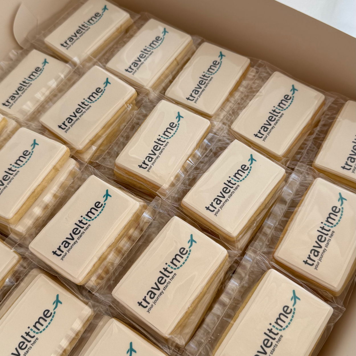 Rectangle shapes shortbread cookies with branded edible logo on top